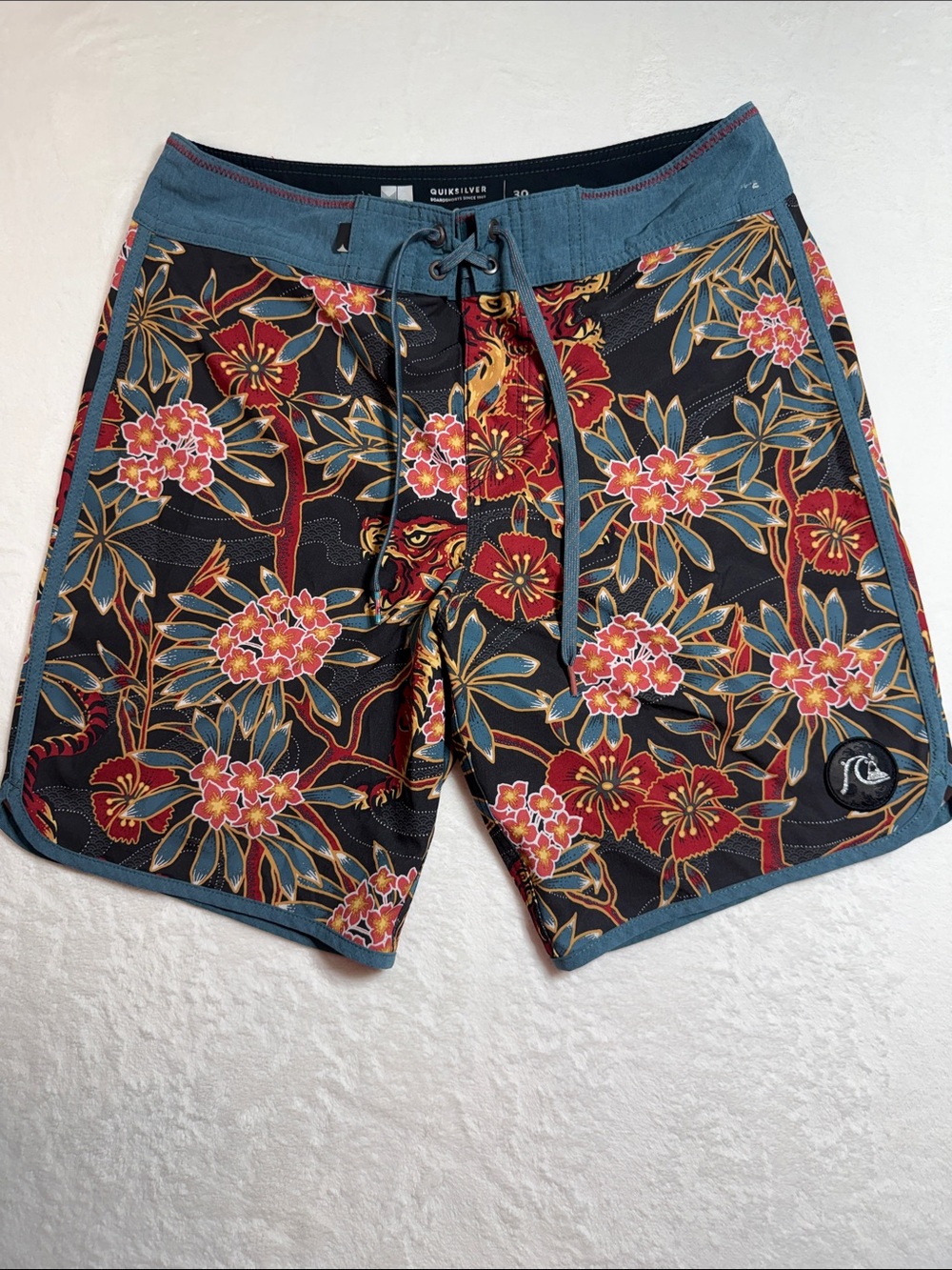 Quiksilver Men’s Black Floral Boardshorts with Blue Trim